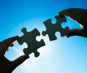 Jigsaw Pieces Joining Together to show that short term planning will help with your networking road map