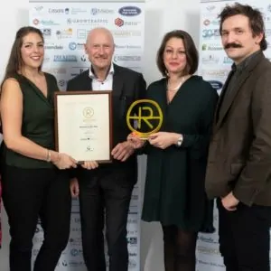 Photo taken by Liz Hall From Liz Henson Photography Rachel Weinhold, Hannah Weinhold and Simon Dalley winning a Rossendale Business Award in 2019 showing how networking has helped the business to grow