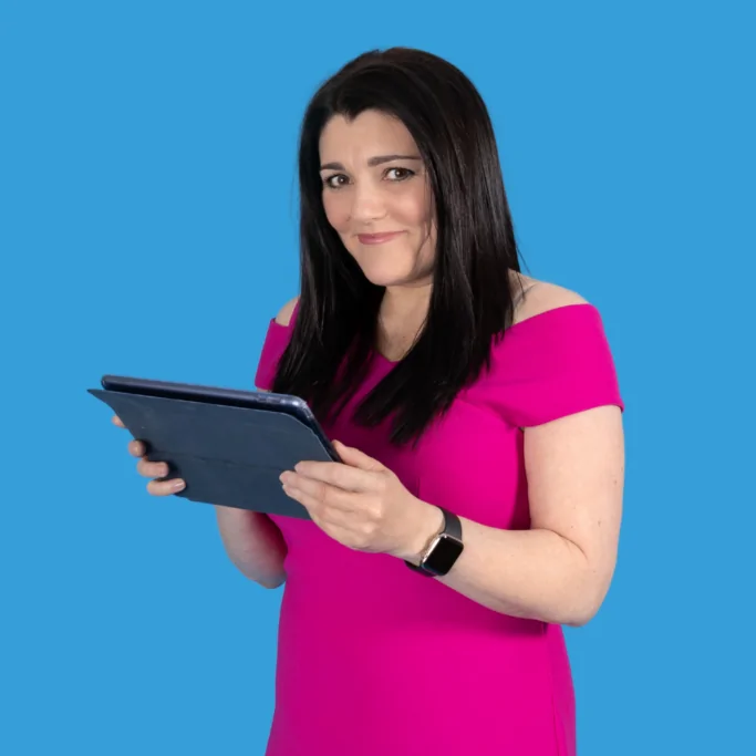 Tracy Heatley with her ipad ready to show someone her networking training information. This image is for the home page.