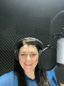 Tracy in the studio recording her podcast episode about crafting your small business value proposition