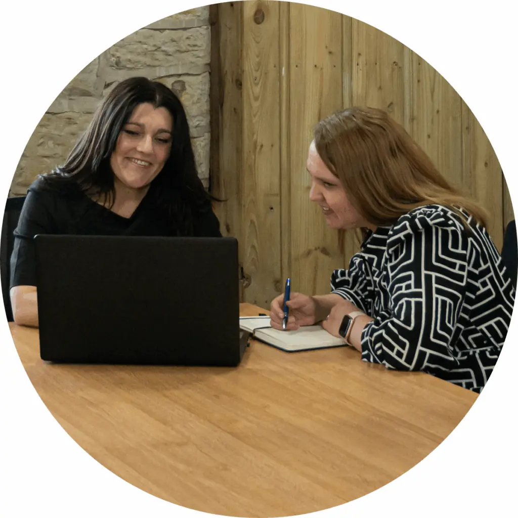 Tracy & Hannah OMD webpage Tracy Heatley with a female service-based business client during an Outsourced Marketing Director session